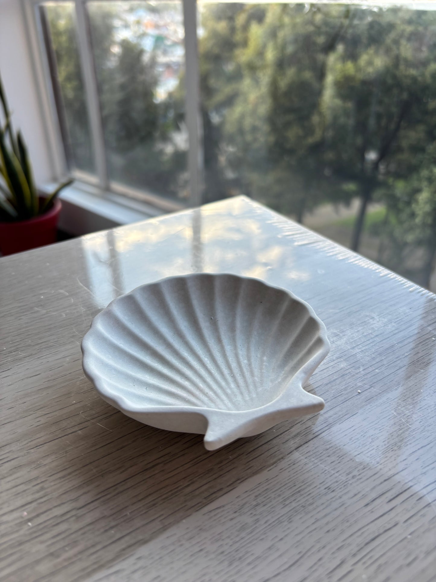 Recipiente en cemento para velas concha de mar